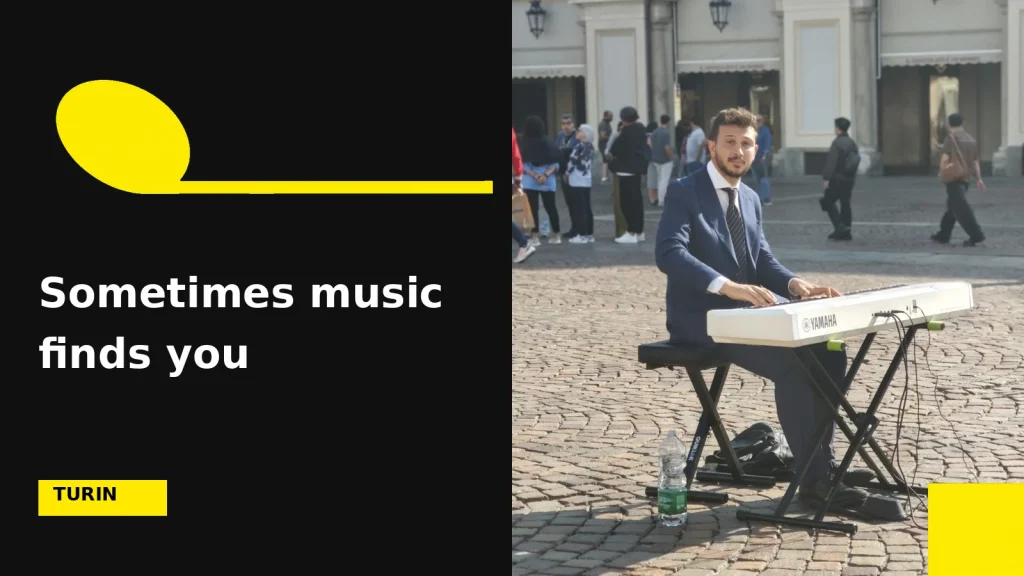Musician in a blue suit at a keyboard in Turin, on the cover of “Sometimes music finds you”.